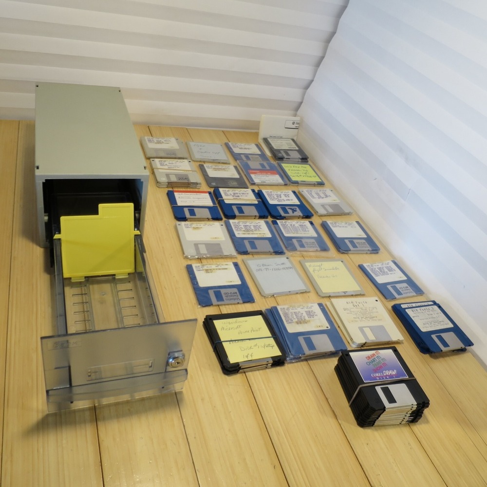 Untested Lot of PC Computer Software 3.5 in. Floppy Disks in Banx Storage Caddy